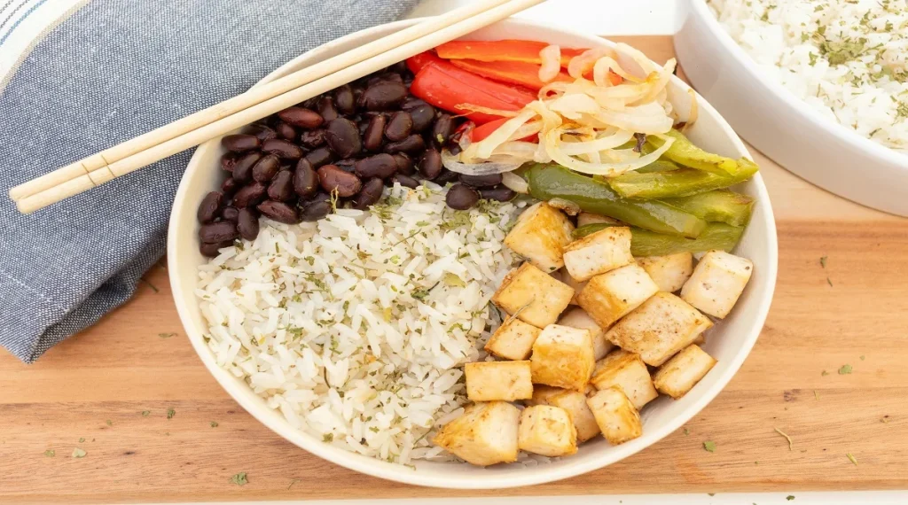 food picks for easy weeknight dinners shown in a rice and bean bowl