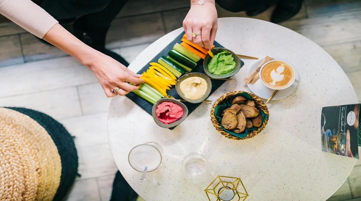 food myths about snacking shown through healthy snack options on a table