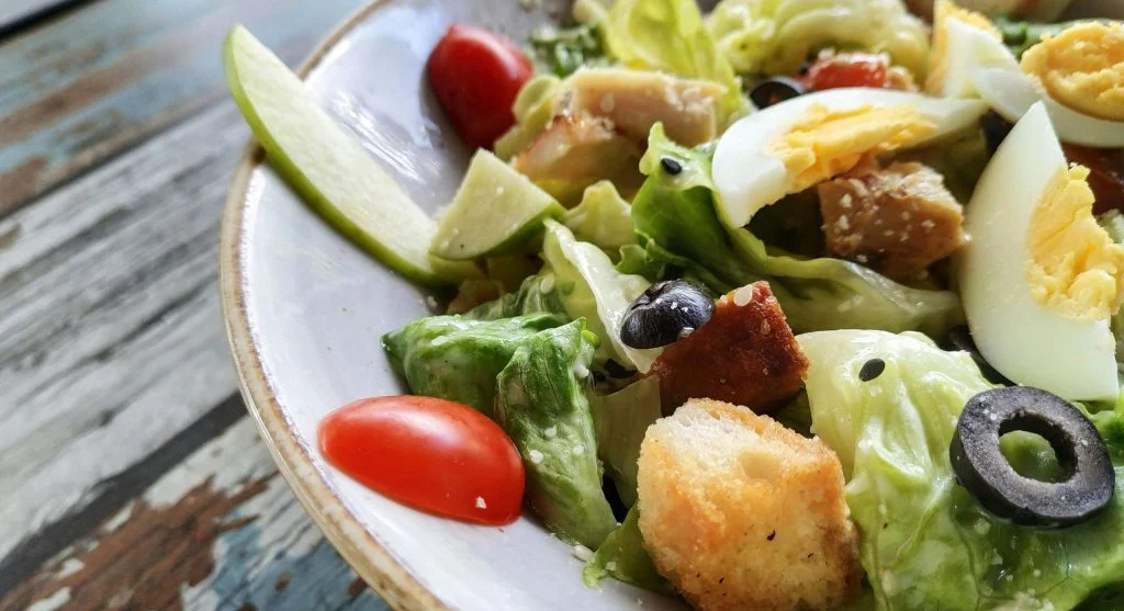 Boiled eggs and cherry tomatoes for a healthy snack