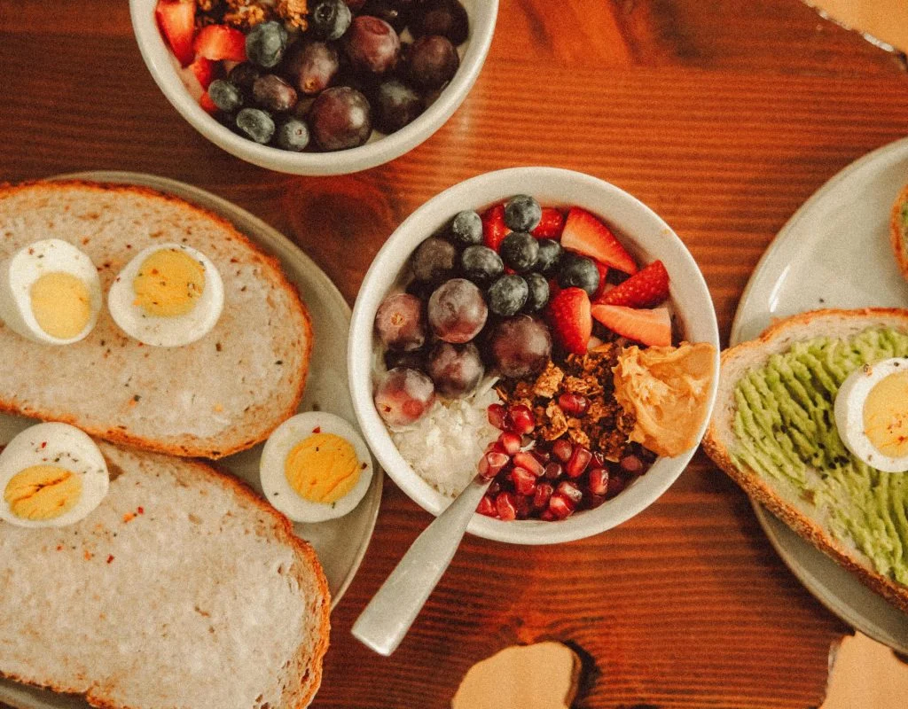 Breakfast food picks with cottage cheese, fruit, and toast