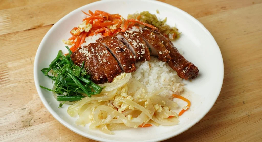 Grilled chicken and vegetable plate with rice