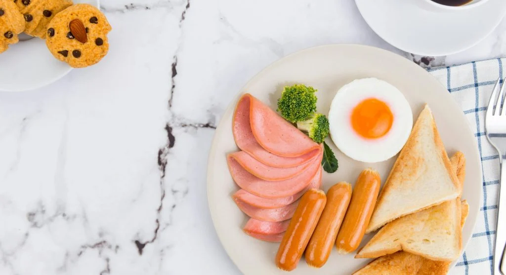 eggs on toast with fruit and tea