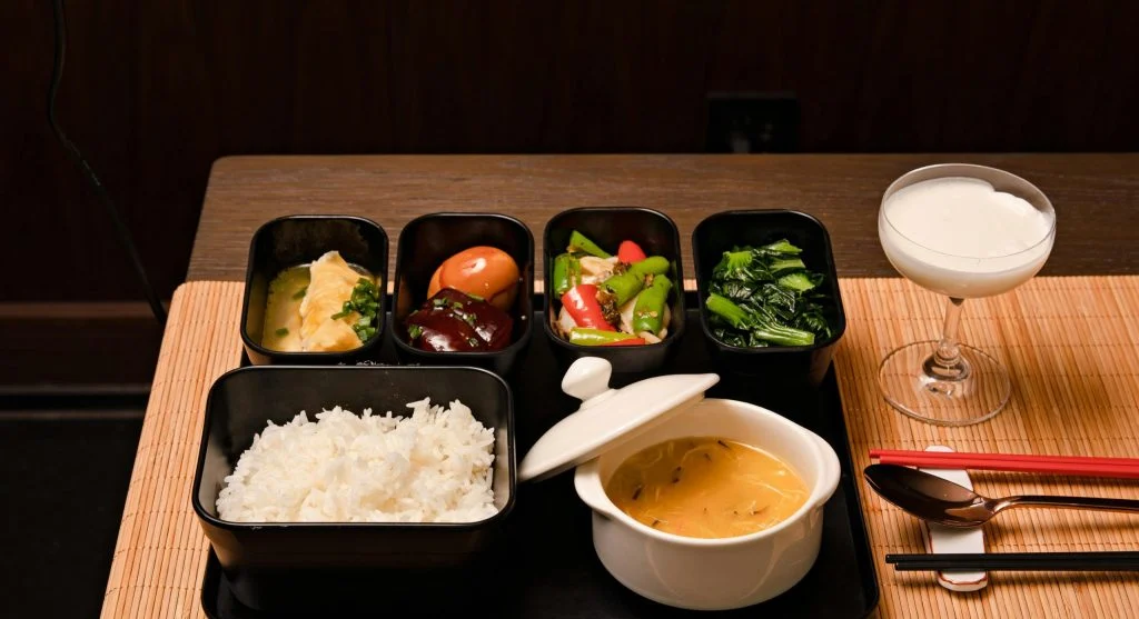 rice bowl with beans veggies yogurt sauce